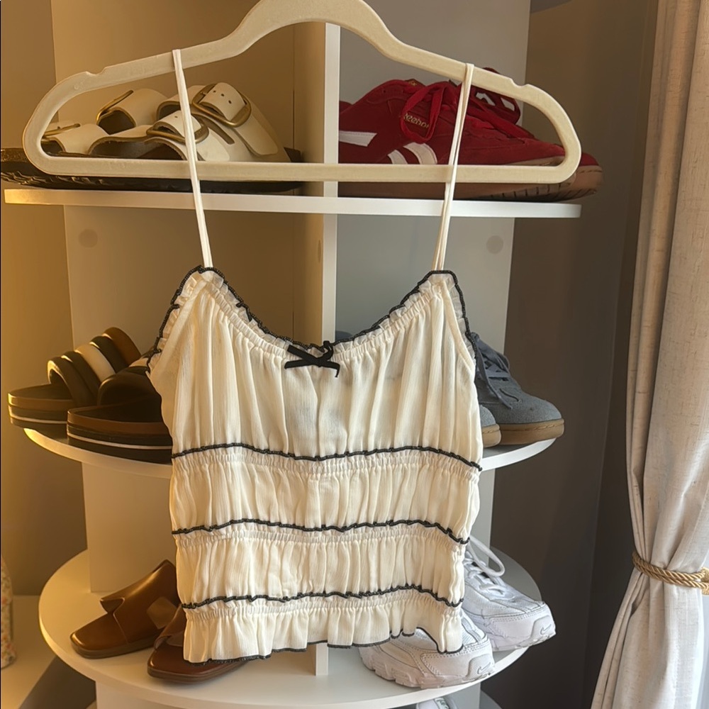 Elegant Cream Top with Black Trim
